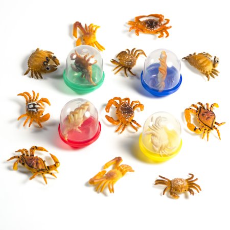 Игрушки в капсулах 28 мм 